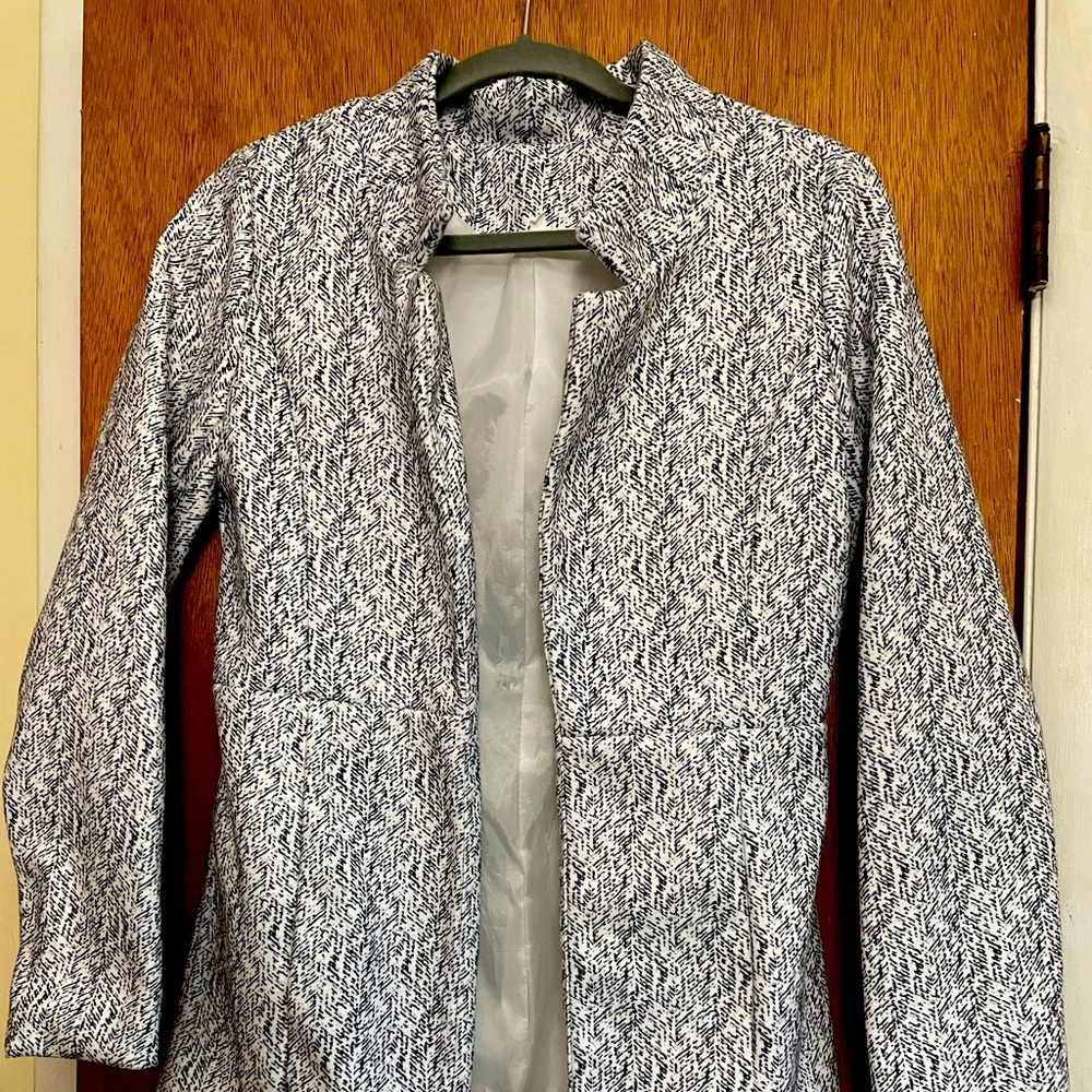 Black and white lined dress blazer. Never worn!